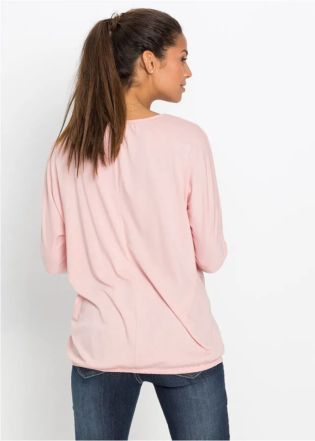 Camiseta oversize rosa viejo