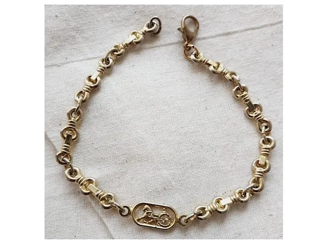 Céline Brazalete Celine vintage Dorado 